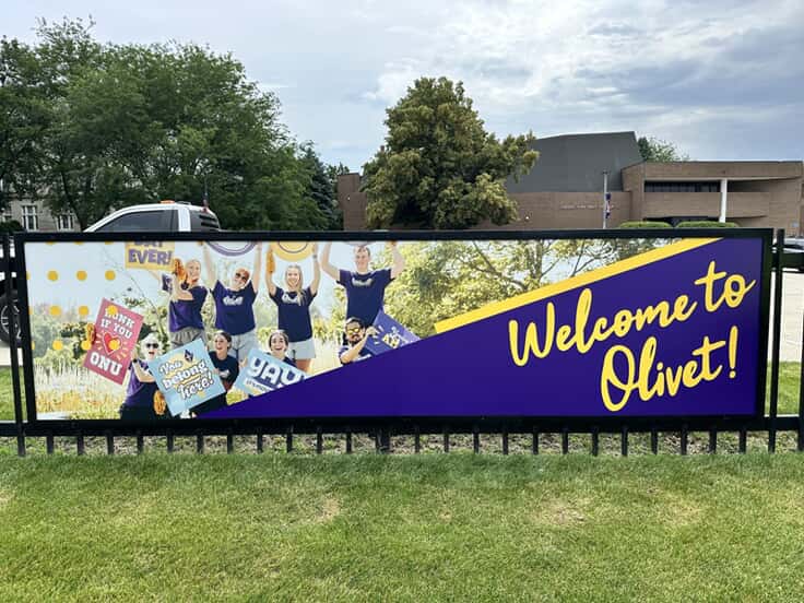An image of a Welcome to Olivet banner sign.